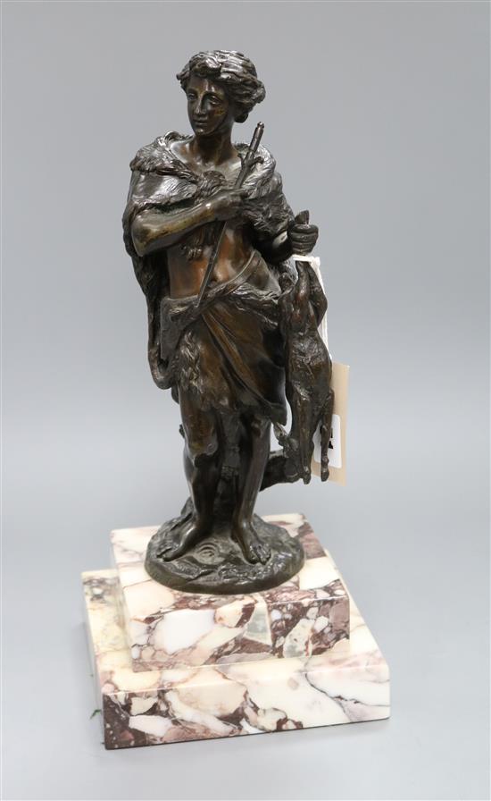 Bayer, A figural 19th century bronze of a huntsman holding a hare, signed, height 38cm